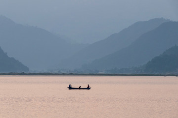 The tourist enjoying on paddle boat in Phewa lake