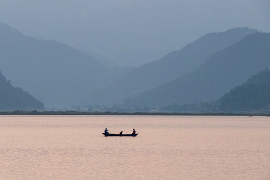 The tourist enjoying on paddle boat in Phewa lake