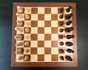 Wooden chess board with figures