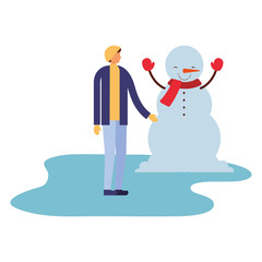 man with snowman in the winter season