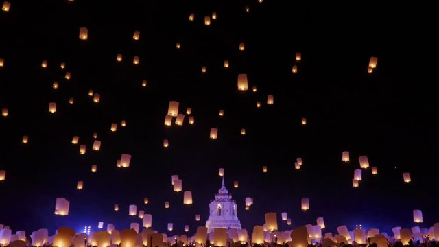 Tourist floating sky lanterns in Loy Krathong festival , Chiang Mai ,Thailand.