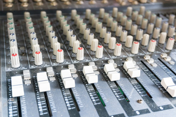 Fototapeta premium Audio Mixing Console Closeup in selective focus