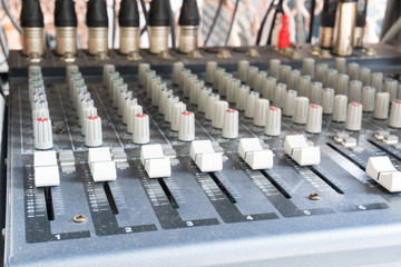 Fototapeta premium Audio Mixing Console Closeup in selective focus