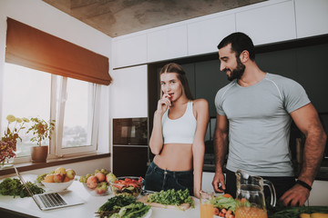 A Couple Is Preparing A Salad For A Breakfast.