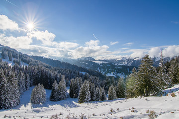 Sunny winter day with lot of snow in mountains of south germany