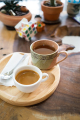 Hot americano  coffee  on wood table
