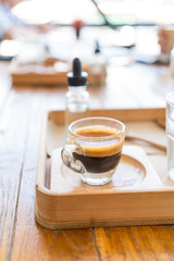 Hot espresso  coffee  on wood table