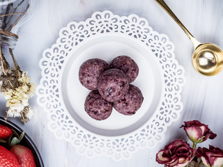 Healthy organic date energy balls with berry, dried fruits and nuts. Food for healthy lifestyle.