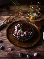Tart Chocolate cheesecake with fresh berries. delicious dessert for Birthday.