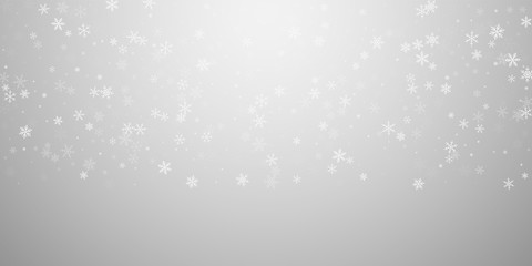 Sparse snowfall Christmas background. Subtle flyin
