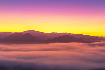 Fototapeta na wymiar Landscape view of sunrise with white fog in early morning on the top of the hill at yun lai viewpoint, pai, Mae Hong Son, thailand