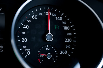 A Modern Car odometer Cluster with LCD Multifunction Display. Meter at constant speed show the fuel...