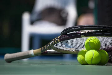 Foto auf Acrylglas Tennis balls and racket on court © yellowj