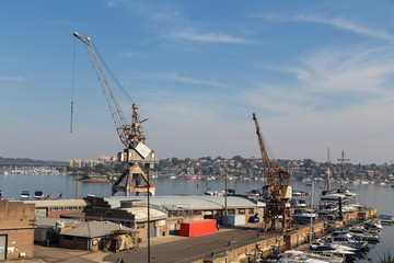Fototapeta na wymiar old cranes and harbour 