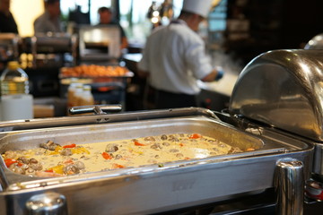 sauce with oven cooked mushrooms in the kitchen of the restaurant