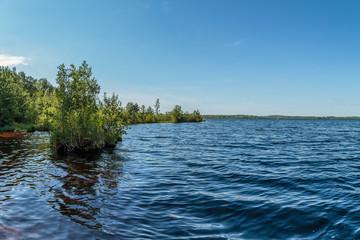 A picturesque lake with water of a reddish hue