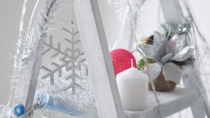 Decorated beautiful stepladder in the new year style. Christmas concept