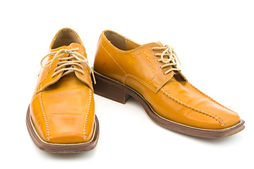 Men's autumn shoes made of genuine brown leather with laces on an isolated background. Classic shoes 