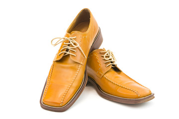 Men's autumn shoes made of genuine brown leather with laces on an isolated background. Classic shoes 
