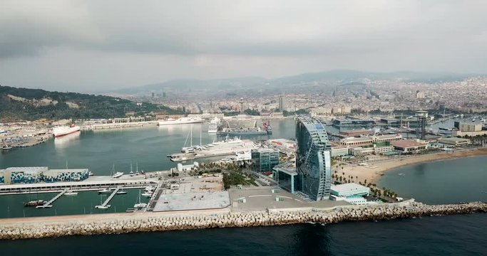   View from drone of Barceloneta beach with luxury hotel W Barcelona