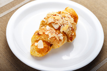fresh croissant on a plate