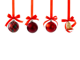 Christmas balls with ribbons and bow on white