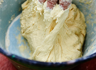 Chef hands cooking dough for pizza. Food concept