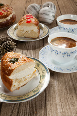 Two cut pieces of Spanish typical dessert of epiphany close-up