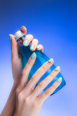 a woman's nail, designed with nail art