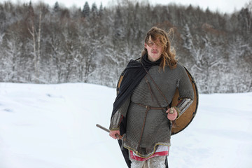 Fototapeta premium Defender the young warrior in mail armor