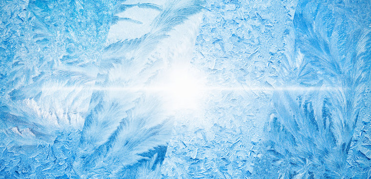 Wide blue winter background, collage of frozen icy windows