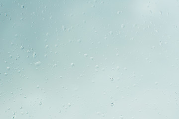 Water drops on a window background, soft focus