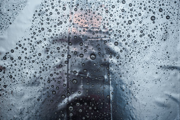 Water droplets on black background