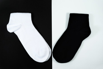 couple new socks black white on background