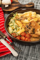 Braised pork chop with mushrooms.