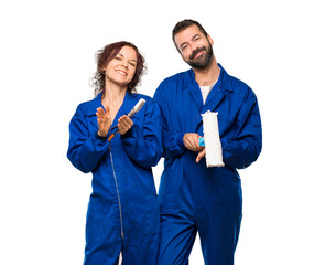 Painters applauding after presentation in a conference on isolated white background