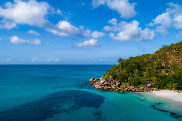 Fototapeta na wymiar Aerial view of beautiful island at Seychelles in the Indian Ocean. Top view from drone