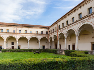 Fototapeta na wymiar Inner courtyard of the cloister of the abbey of Carceri.