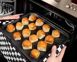 MAN BAKING GARLIC DOUGH BALLS