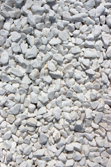 Marble crumb, natural mineral white background. Textured surface of decorative crushed stone.