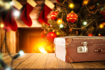 Christmas time and brown old suitcase 