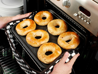 MAN BAKING BAGELS