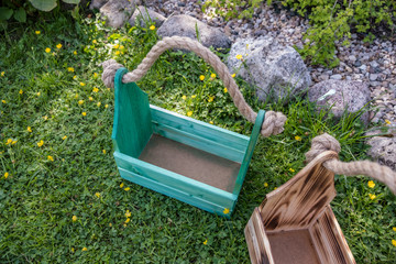 Homemade drawers with rope handles against the backdrop of nature