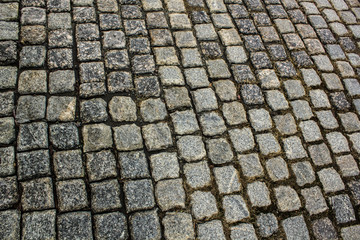 Paving grey cobbles stones retro road