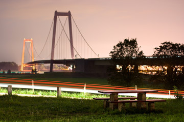 Picnic Area And Suspension Bridge At Night