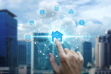 Finger touch with property investment icons