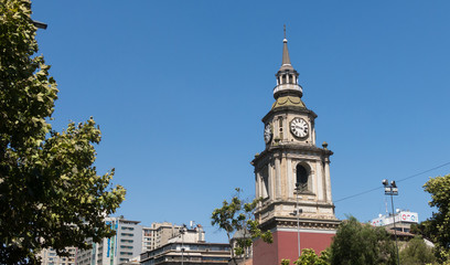 Obraz premium The church of San Francisco, Catholic temple and old convent, in the Alameda, the main avenue of Santiago de Chile.