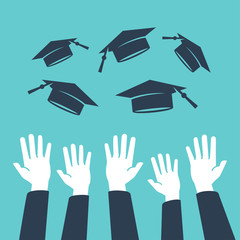 Concept of education, hands of graduates throwing graduation hats in the air