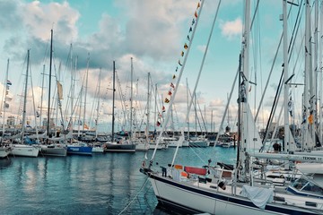 sailboats moored up waiting on the pontoon just days before the arc 2018 atlantic crossing sailing regatta starts during sunset