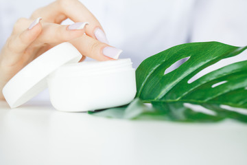 Scin Care. Scientist hands testing texture of beauty products